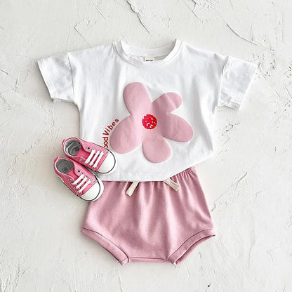 Zonnebloem baby-outfit – T-shirt en short